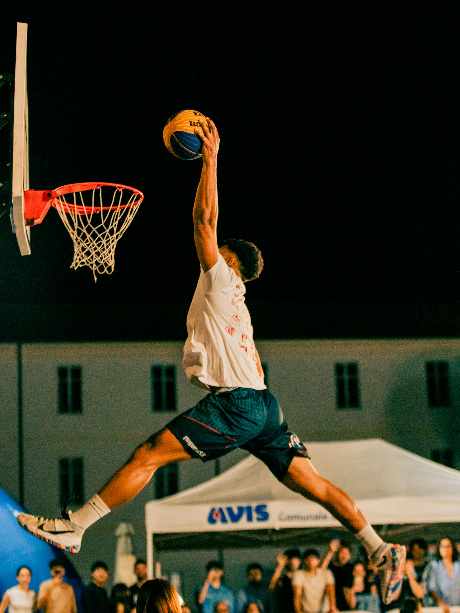Basketball player dunking
